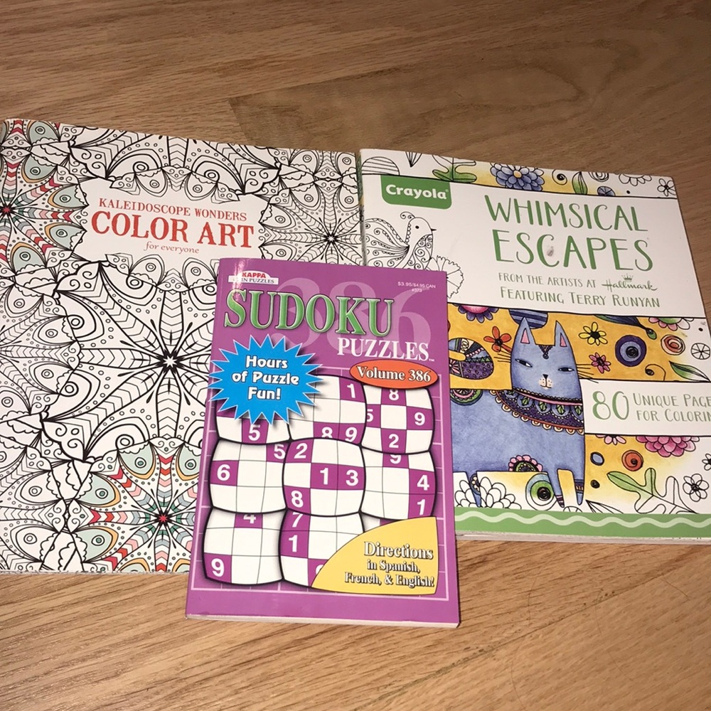 Bundle of coloring books ; one sudoku book.